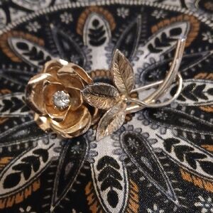 Elegant Gold and Silver Floral Brooch